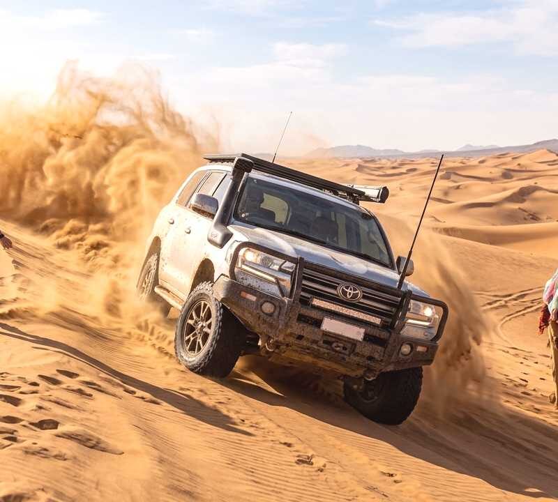 lc 200 dune bashing camel riding and sandboarding 1